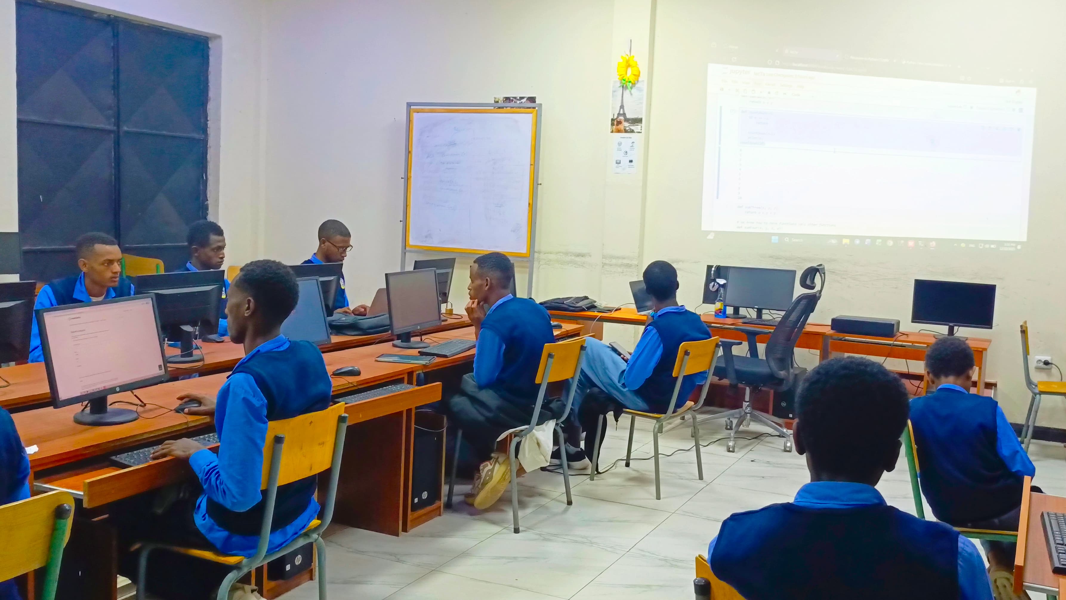 Students presenting a finished coding project at the end of the DoCoder Program